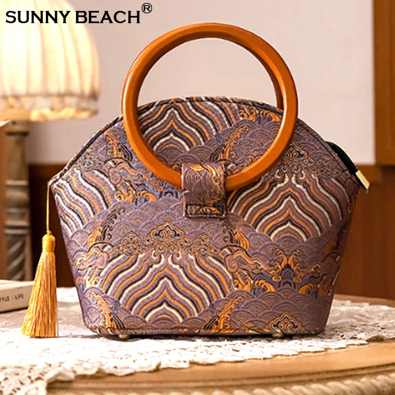 Design Wooden Handle Circular Shell Women Handbag 2024 New Fashion Women Bag Print Tassel Clutch Bag
Design Wooden Handle Circular Shell Women Handbag 2024 New Fashion Women Bag Print Tassel Clutch Bag