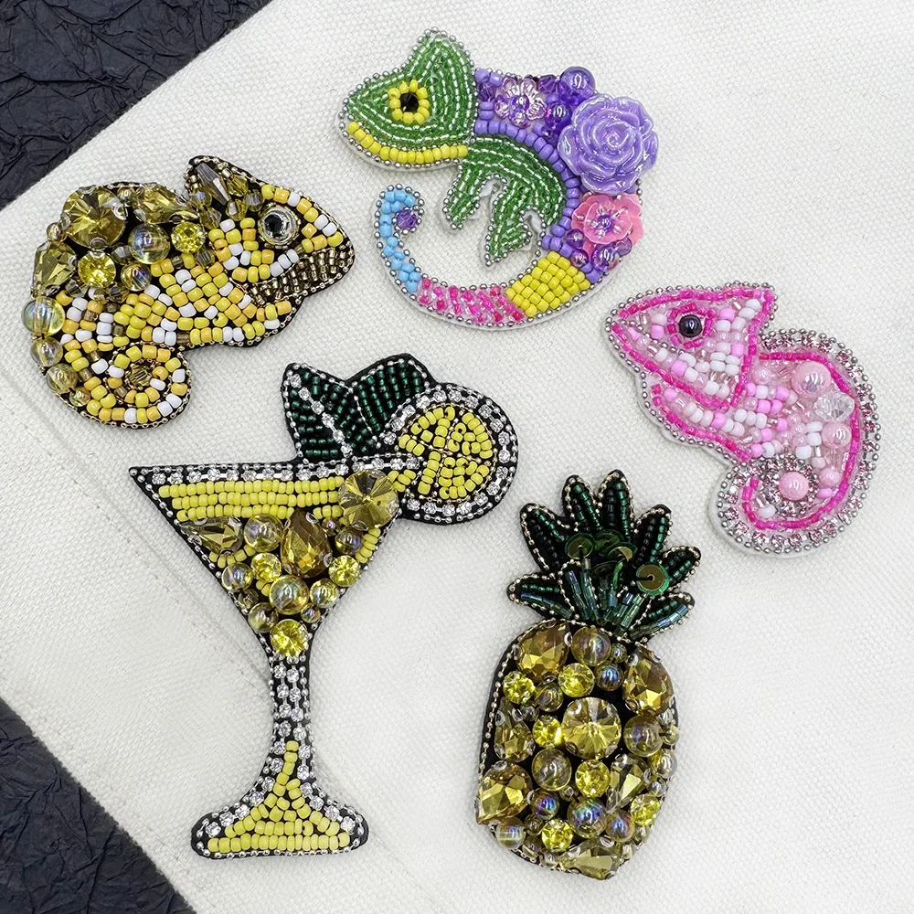 Нашивка из бисера в виде ящерицы и стакана с ананасовым соком для одежды, сумок, шитья и декора
Нашивка из бисера в виде ящерицы и стакана с ананасовым соком для одежды, сумок, шитья и декора