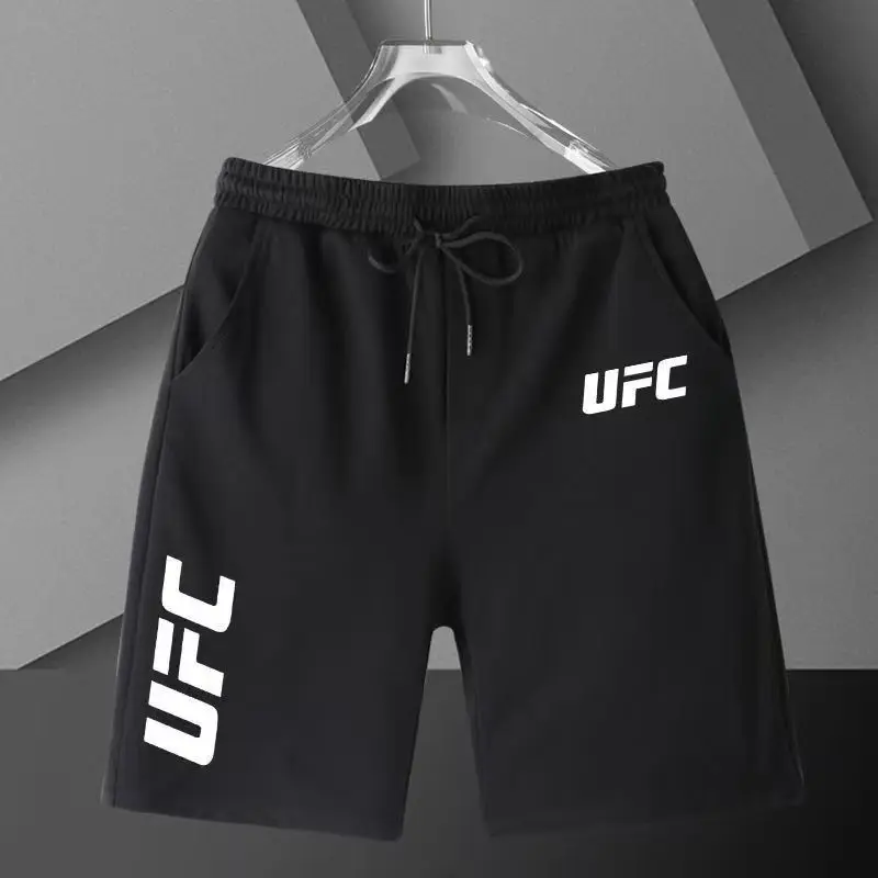 Летние мужские повседневные спортивные шорты UFC для бокса Санда, свободные брюки, дышащие четверть брюк, повседневные брюки
Летние мужские повседневные спортивные шорты UFC для бокса Санда, свободные брюки, дышащие четверть брюк, повседневные брюки