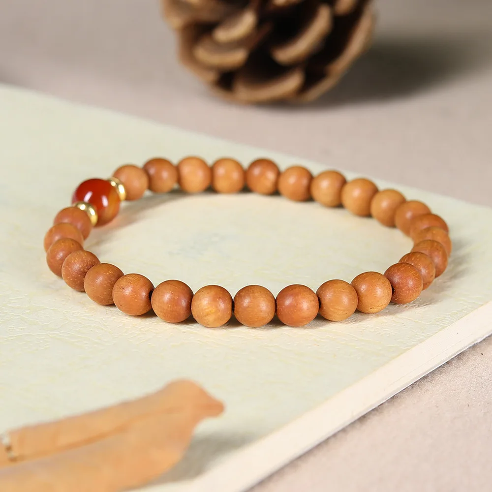Natural Sandalwood Buddhist Bead Bracelet with Red Agate Spacers Chinese Style Wooden Jewelry for Men and Women Couples Gifts
Natural Sandalwood Buddhist Bead Bracelet with Red Agate Spacers Chinese Style Wooden Jewelry for Men and Women Couples Gifts