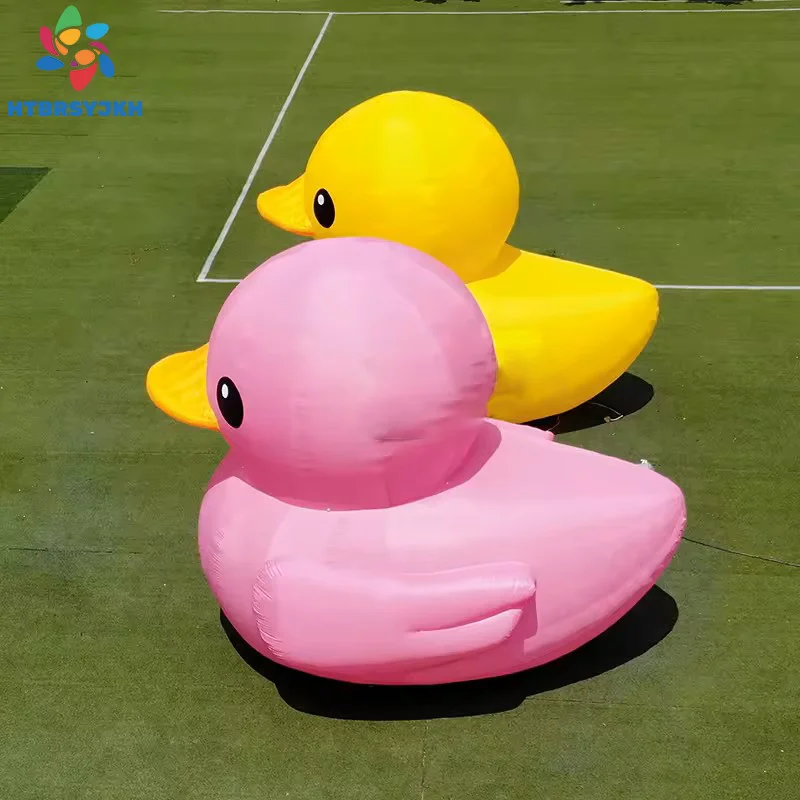 Гигантский надувной мультяшный желтый уток Розовая/желтая маленькая утка надувной шар с воздуходувкой Воздушный шар для показа активного отдыха
Гигантский надувной мультяшный желтый уток Розовая/желтая маленькая утка надувной шар с воздуходувкой Воздушный шар для показа активного отдыха