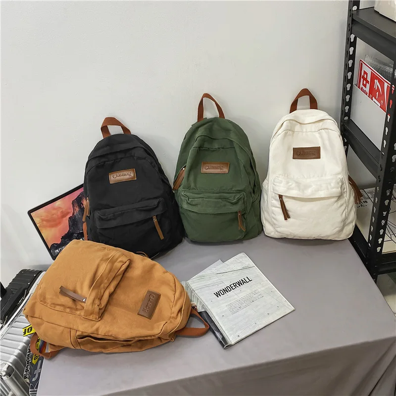 Vintage canvas schoolbag, male and female college students, high school students, simple solid backpack, travel backpack
Vintage canvas schoolbag, male and female college students, high school students, simple solid backpack, travel backpack