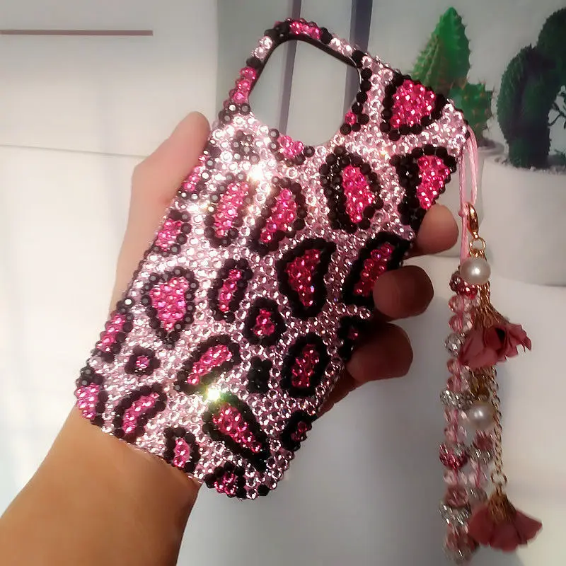 Luxury Handmade Diamond Studded Phone Case with Crystal Hanging Chain Protective Case for iPhone 15 Pro Max 14 Plus 13 12 11
Luxury Handmade Diamond Studded Phone Case with Crystal Hanging Chain Protective Case for iPhone 15 Pro Max 14 Plus 13 12 11