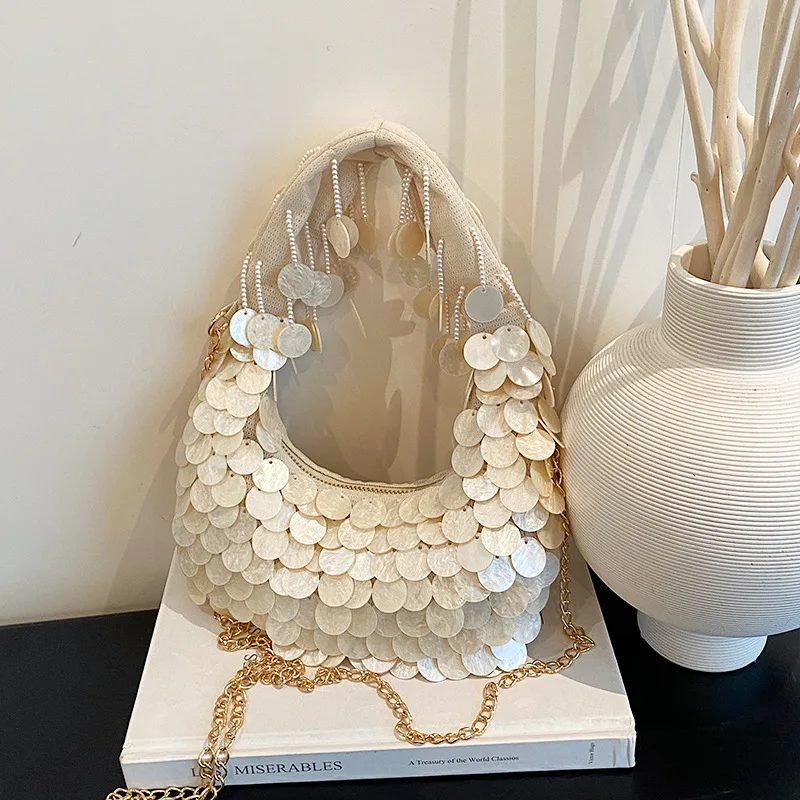 Round-Shape Shell Tassel Women's Handbag 2026 Summer French Fashion Luxury Design Elegant Creativity Lady Evening Clutch Bags
Round-Shape Shell Tassel Women's Handbag 2026 Summer French Fashion Luxury Design Elegant Creativity Lady Evening Clutch Bags