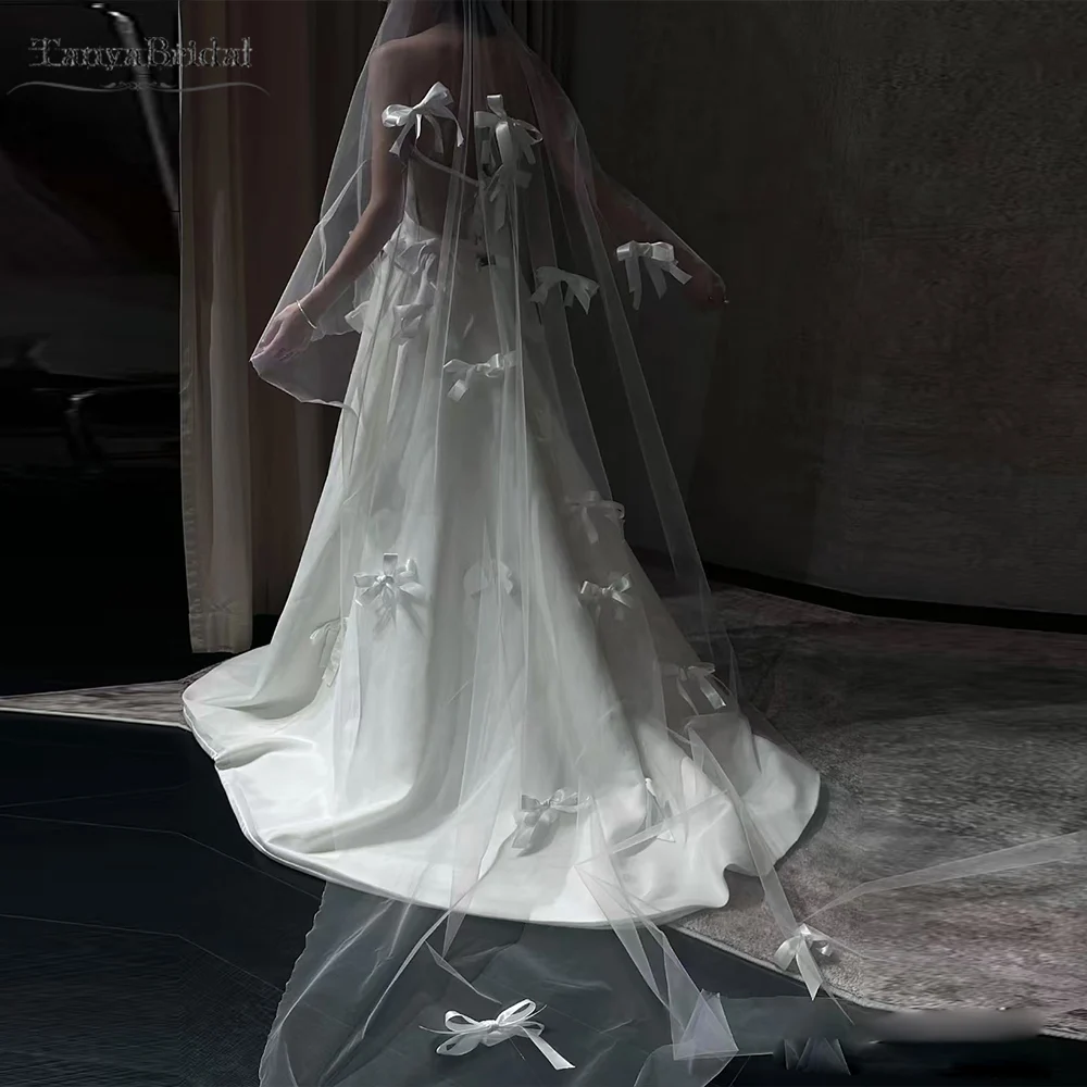 Простая однослойная фата из тюля, шитье с небольшими лентами-бабочкой и Com, фата для невесты DV096 
Простая однослойная фата из тюля, шитье с небольшими лентами-бабочкой и Com, фата для невесты DV096