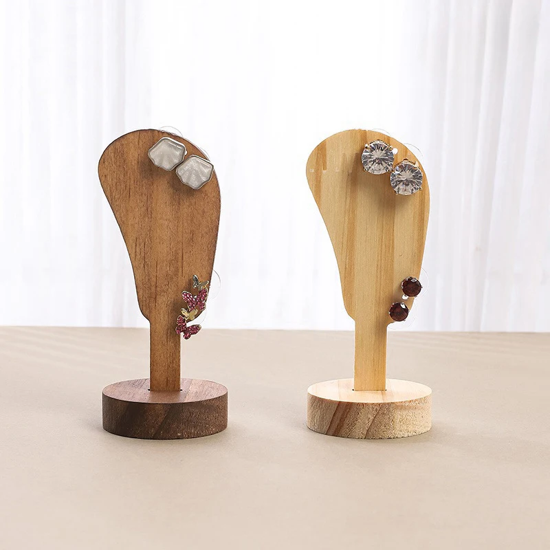 1pcs Wood Ear Shaped Jewelry Earring Holder Display Stand Fashion Ear-shaped Ear Clip Stud Suitable For Jewelry Earrings
1pcs Wood Ear Shaped Jewelry Earring Holder Display Stand Fashion Ear-shaped Ear Clip Stud Suitable For Jewelry Earrings