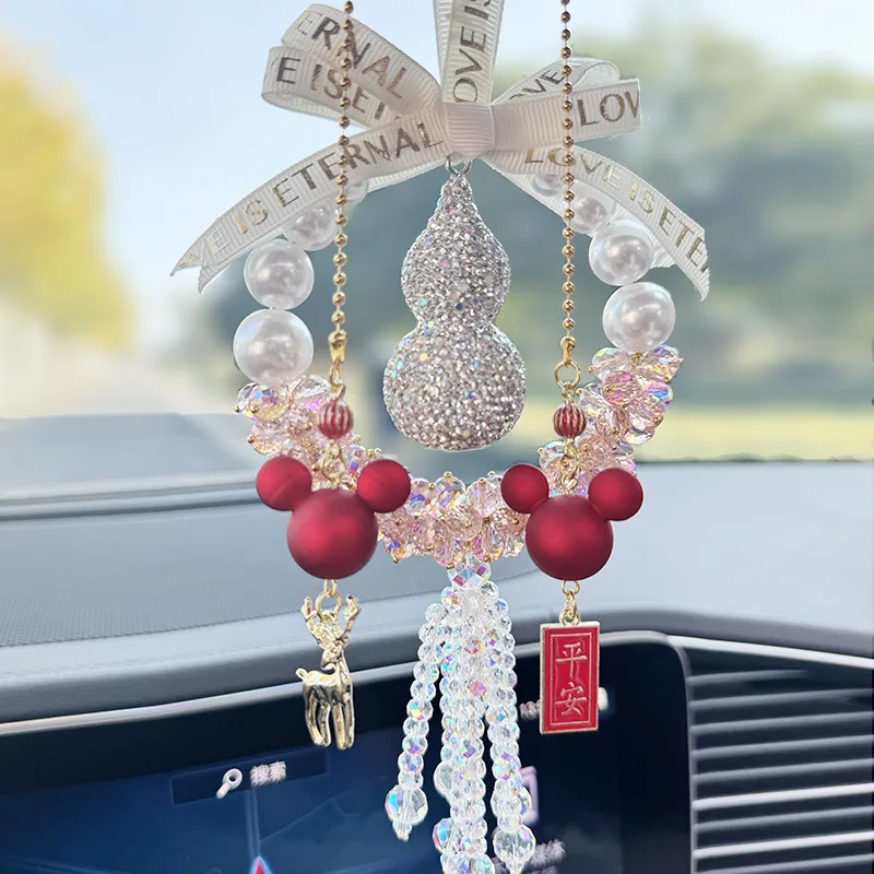 Diamond-encrusted gourd crystal car pendant for women, high-end car interior rearview mirror hanging ornament.
Diamond-encrusted gourd crystal car pendant for women, high-end car interior rearview mirror hanging ornament.