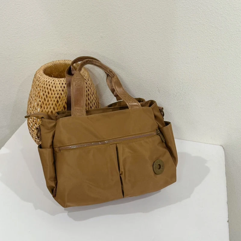 Waterproof Ox Cloth Tote Bag Multi-carent Large Capaci Single oulder Crossbody Commuter Women's Bag by Bo Pu
Waterproof Ox Cloth Tote Bag Multi-carent Large Capaci Single oulder Crossbody Commuter Women's Bag by Bo Pu