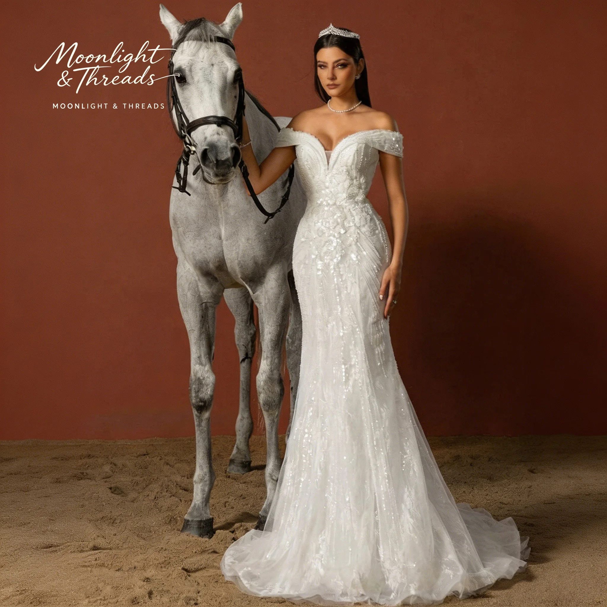 White off-the-shoulder V-neck sleeveless floor-length formal wedding gown featuring beadwork sequins and appliqué detailing
White off-the-shoulder V-neck sleeveless floor-length formal wedding gown featuring beadwork sequins and appliqué detailing