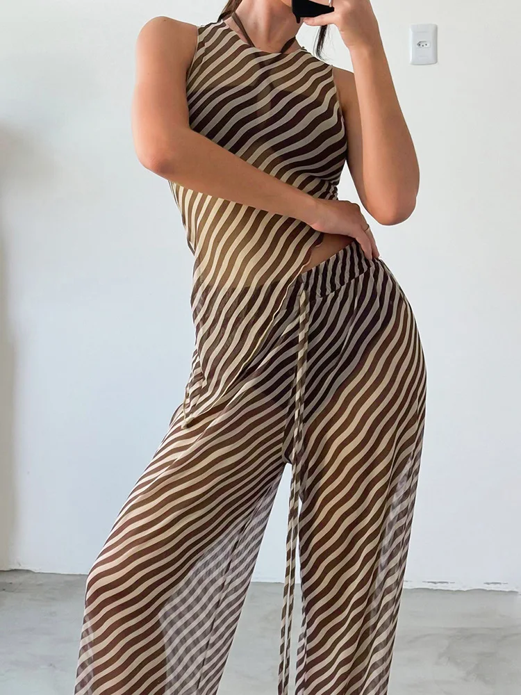 Elegant Sexy 2025 Summer Two Pieces Pants Set Beach Vacation Outfit Women's Irregular Mesh Tops and Loose Pants Suit Streetwear
Elegant Sexy 2025 Summer Two Pieces Pants Set Beach Vacation Outfit Women's Irregular Mesh Tops and Loose Pants Suit Streetwear