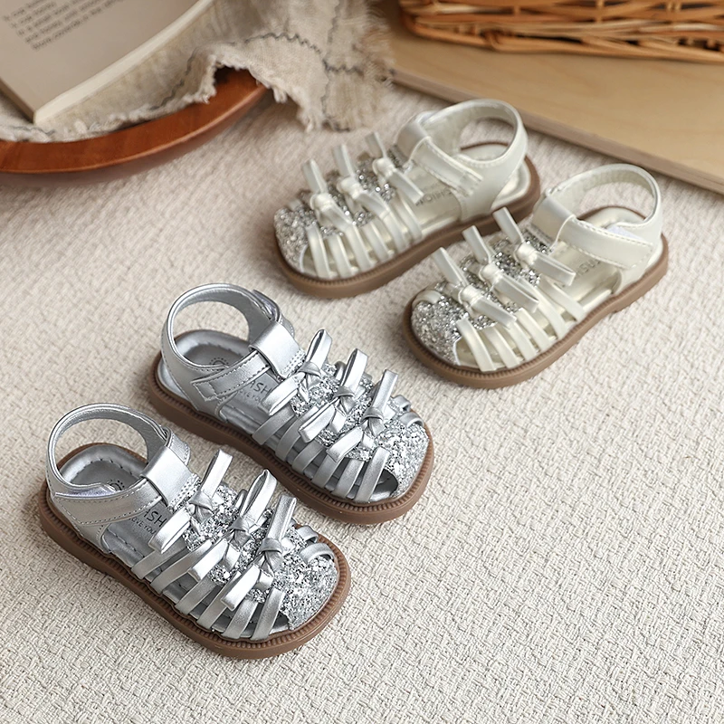Toddler Girls Glitter Bow Sandals Hollow Out Kids Closed Toe Weave Flat Shoes Children Princess Party Casual Sandals Summer New
Toddler Girls Glitter Bow Sandals Hollow Out Kids Closed Toe Weave Flat Shoes Children Princess Party Casual Sandals Summer New