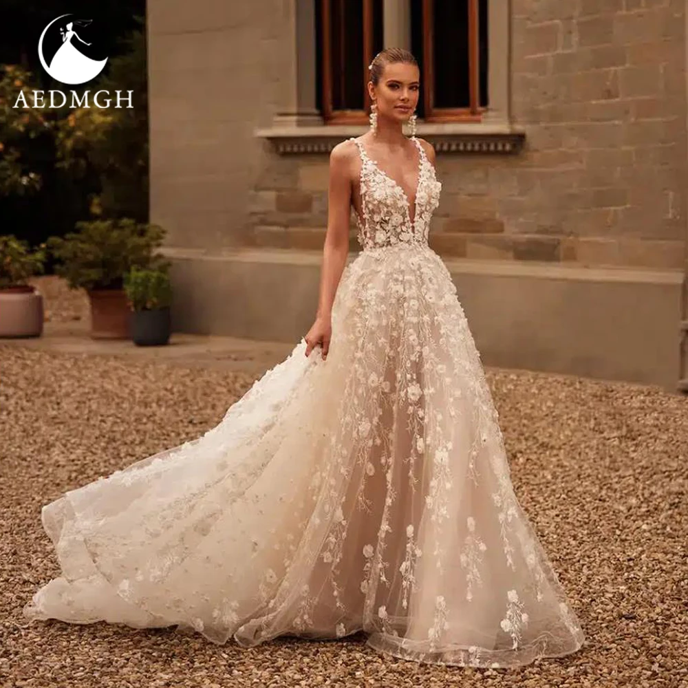 Элегантное свадебное платье A-Line Aedmgh с V-образным вырезом, на тонких бретельках, с кружевной вышивкой и цветами, на заказ
Элегантное свадебное платье A-Line Aedmgh с V-образным вырезом, на тонких бретельках, с кружевной вышивкой и цветами, на заказ