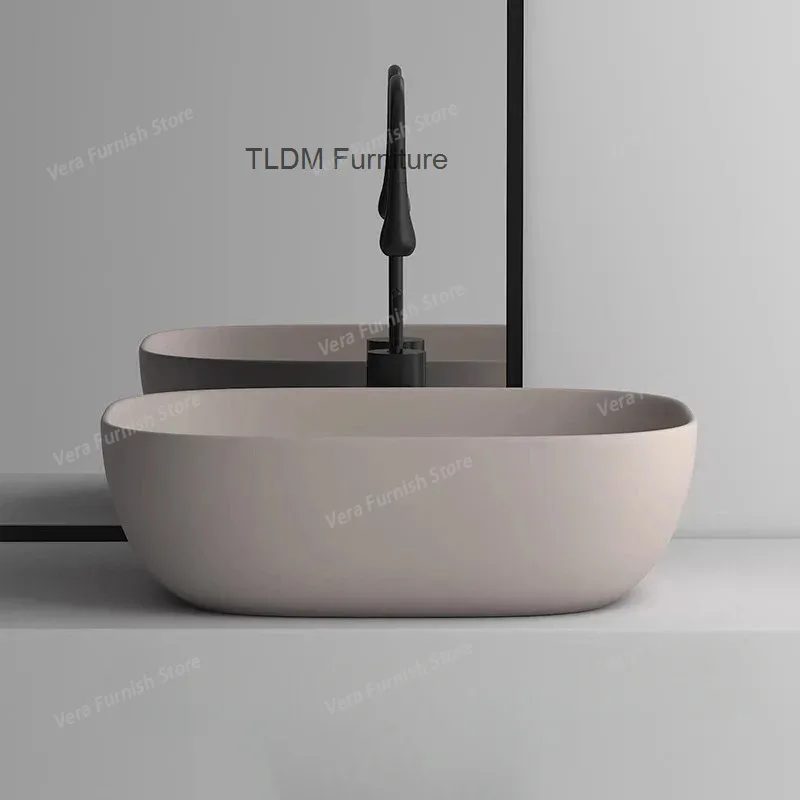 Modern Ceramic Bathroom Sinks for Kitchen Oval Deepened Matte Basin Light Luxury Khaki Easy To Clean Design Sink for Courtyard
Modern Ceramic Bathroom Sinks for Kitchen Oval Deepened Matte Basin Light Luxury Khaki Easy To Clean Design Sink for Courtyard
