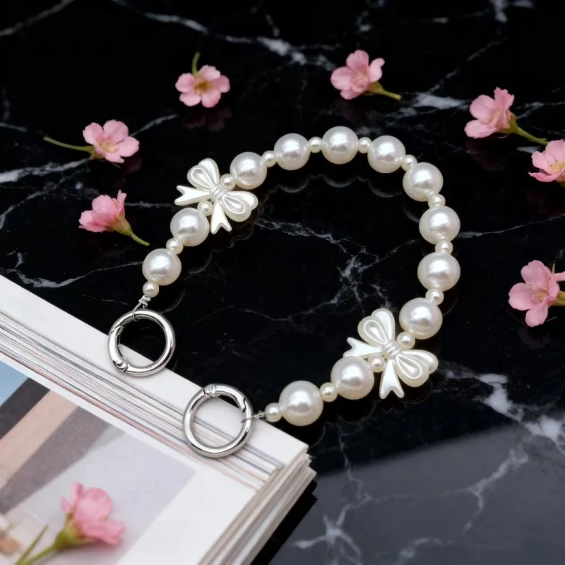 Butterfly Knot Pearl Phone Chain Ins Fashion Women's Wrist Pendant Short Phone Case Bag Keychain Pendant Anti Loss
Butterfly Knot Pearl Phone Chain Ins Fashion Women's Wrist Pendant Short Phone Case Bag Keychain Pendant Anti Loss
