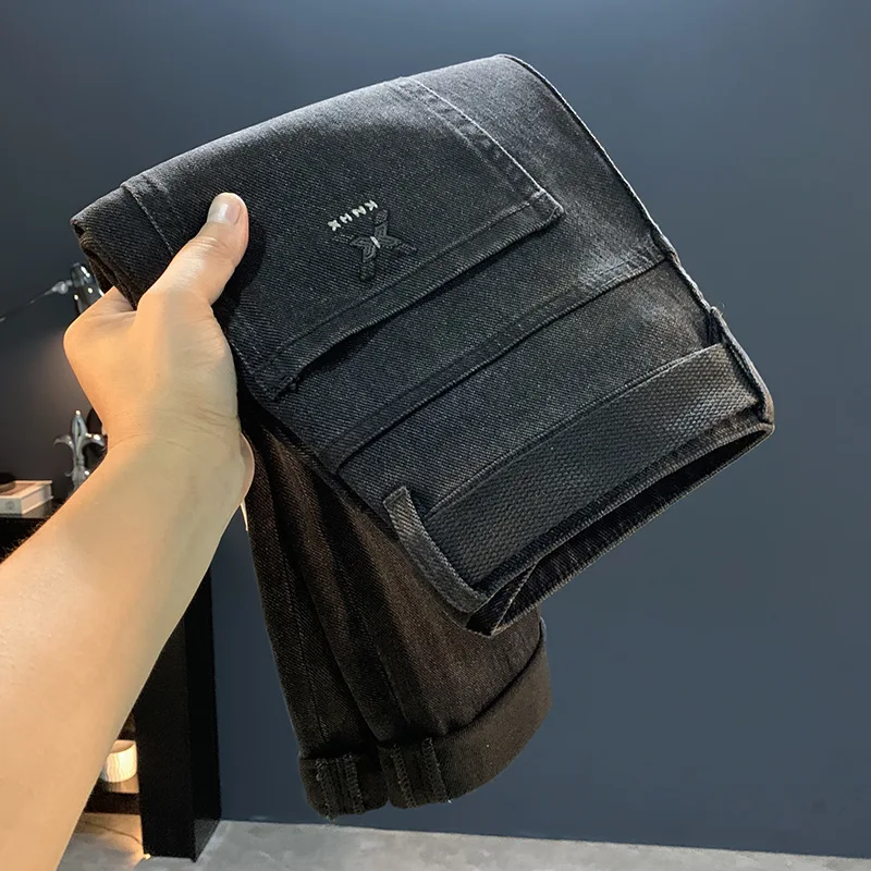 Черные джинсы мужские, осень 2024, новая мужская одежда, элитные модные брендовые повседневные эластичные узкие брюки с маленькой ногой 
Черные джинсы мужские, осень 2024, новая мужская одежда, элитные модные брендовые повседневные эластичные узкие брюки с маленькой ногой