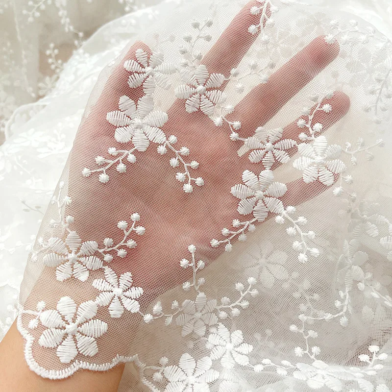 Mesh lace embroidered fabric lace wedding dress clothing fabric for children's clothes handmade DIY sewing sheer fabric 
Mesh lace embroidered fabric lace wedding dress clothing fabric for children's clothes handmade DIY sewing sheer fabric