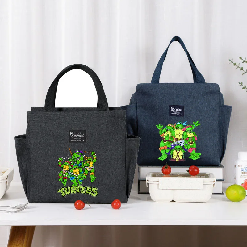 Teenage Mutant Ninja Turtles Lunch Boxes for Man Thermal Lunch Bags Cartoon Food Cooler Handbags Student Picnic Bento Pack
Teenage Mutant Ninja Turtles Lunch Boxes for Man Thermal Lunch Bags Cartoon Food Cooler Handbags Student Picnic Bento Pack