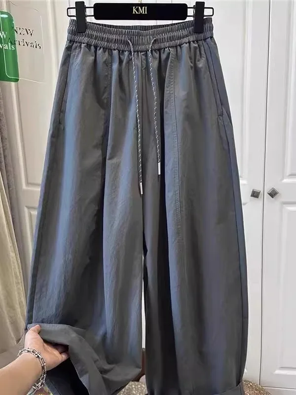 Свободные повседневные брюки унисекс на шнурке, летние тонкие широкие плиссированные брюки для пар, с эластичным поясом
Свободные повседневные брюки унисекс на шнурке, летние тонкие широкие плиссированные брюки для пар, с эластичным поясом