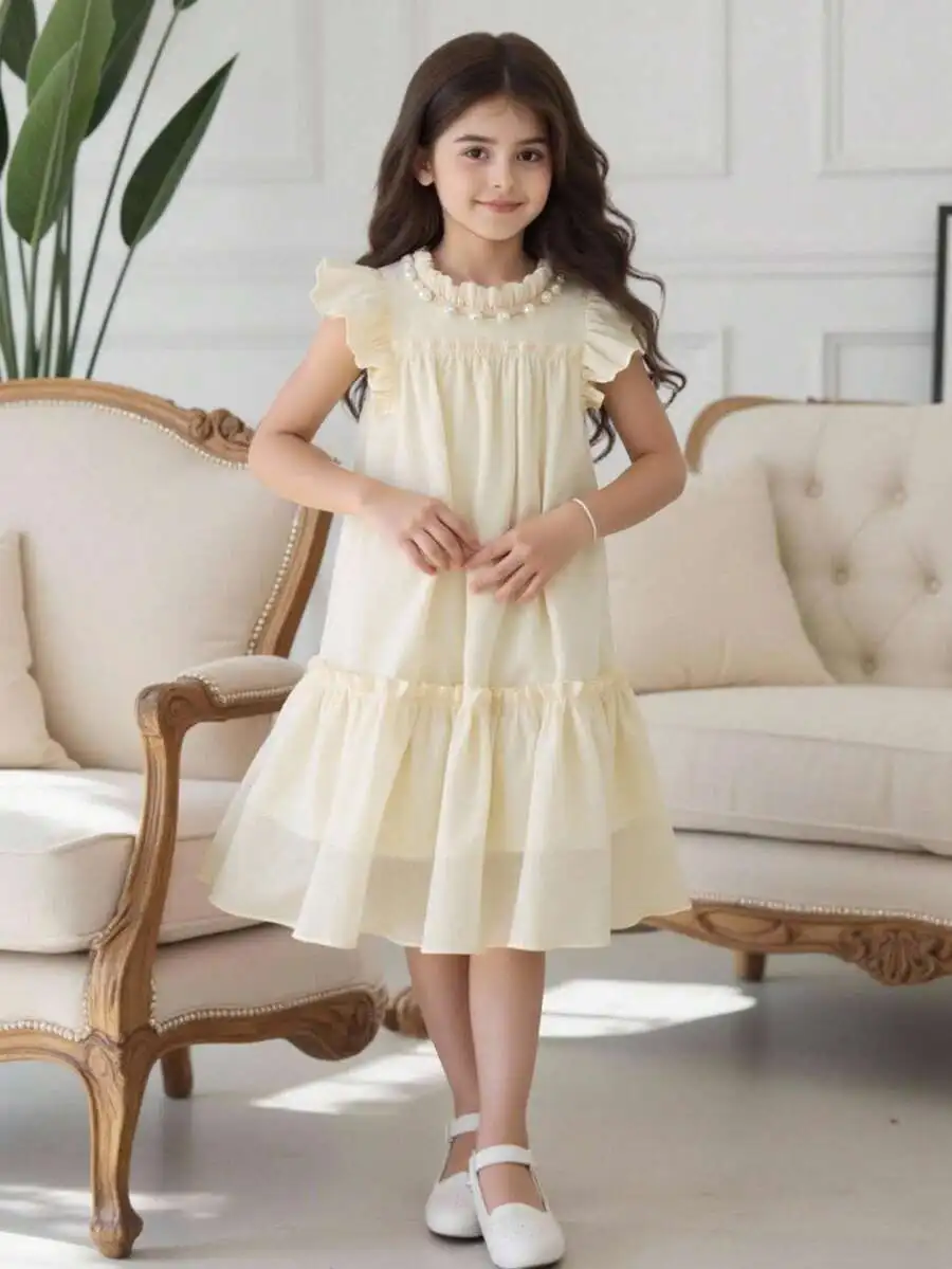 Cream Pearl Decorated Ruffled Sleeveless Round Neck Tiered A-Line Dress
Cream Pearl Decorated Ruffled Sleeveless Round Neck Tiered A-Line Dress