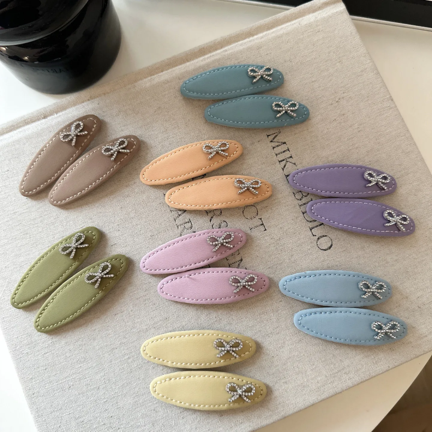 Oval Fabric Hair Clip Skin Friendly Colorful for Side Bangs and Flyaway Cute Bow Design Premium Lightweight Portable
Oval Fabric Hair Clip Skin Friendly Colorful for Side Bangs and Flyaway Cute Bow Design Premium Lightweight Portable