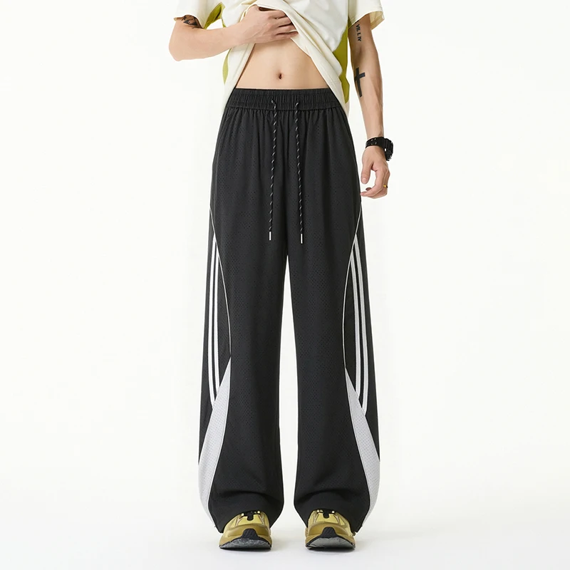 Men Ice Silk Perforated Wide Leg Pants Breathable Quick Dry Casual Streetwear Loose High Waist Trousers with Side Stripe Design
Men Ice Silk Perforated Wide Leg Pants Breathable Quick Dry Casual Streetwear Loose High Waist Trousers with Side Stripe Design