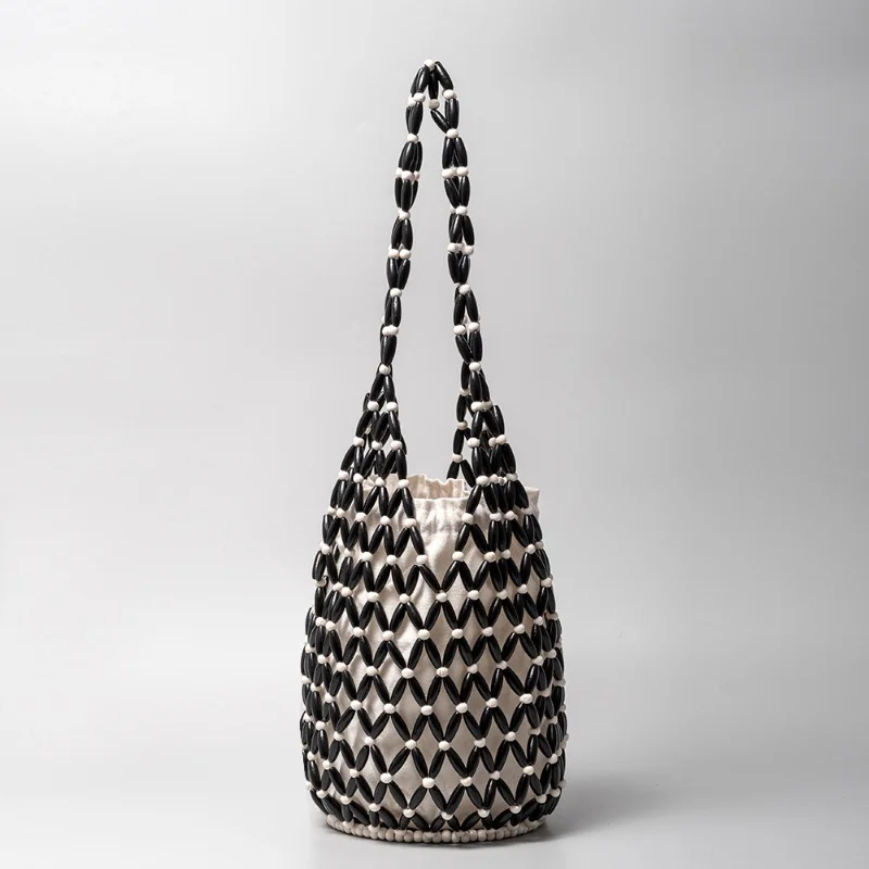 Women Woven Hand Bag Summer Design Hollow-out Wooden Bead Tote Bucket Shoulder Bag Female Reticulate Netted Canvas Beach Handbag
Women Woven Hand Bag Summer Design Hollow-out Wooden Bead Tote Bucket Shoulder Bag Female Reticulate Netted Canvas Beach Handbag