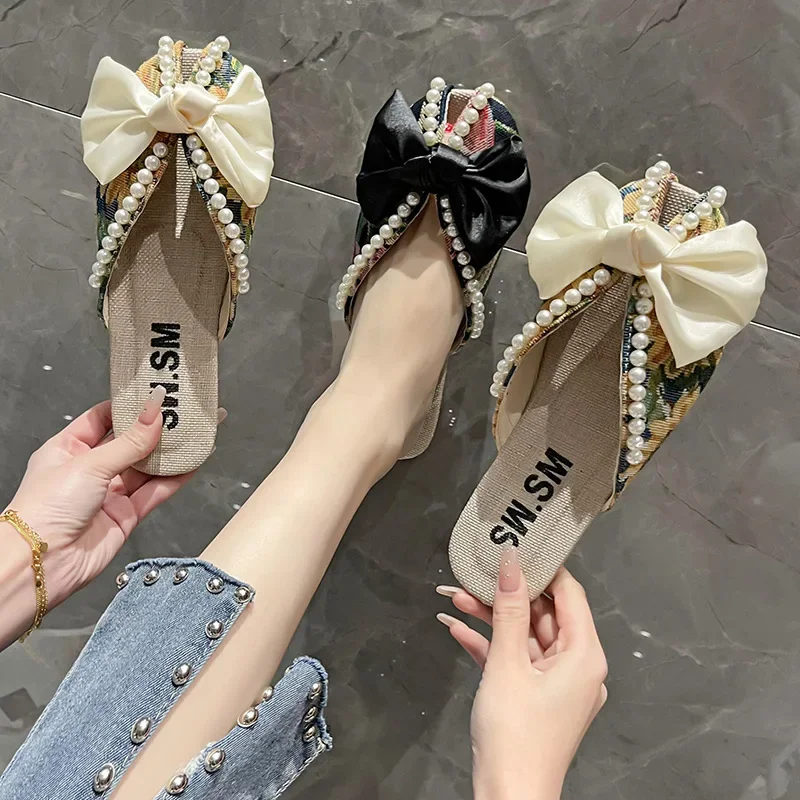 Summer New Baotou Slippers Womenr 2025 Flat Bottom Bow Soft Bottom Cool Slippers Fashion Women Shoes Home-based Slipper
Summer New Baotou Slippers Womenr 2025 Flat Bottom Bow Soft Bottom Cool Slippers Fashion Women Shoes Home-based Slipper