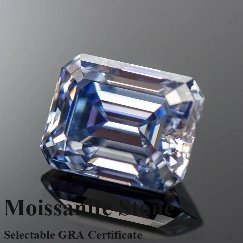 Муассанит Камень Лавандового цвета Изумрудная огранка Драгоценный камень Выращенный в лаборатории бриллиант Усовершенствованные материалы для изготовления ювелирных изделий с сертификатом 
Муассанит Камень Лавандового цвета Изумрудная огранка Драгоценный камень Выращенный в лаборатории бриллиант Усовершенствованные материалы для изготовления ювелирных изделий с сертификатом