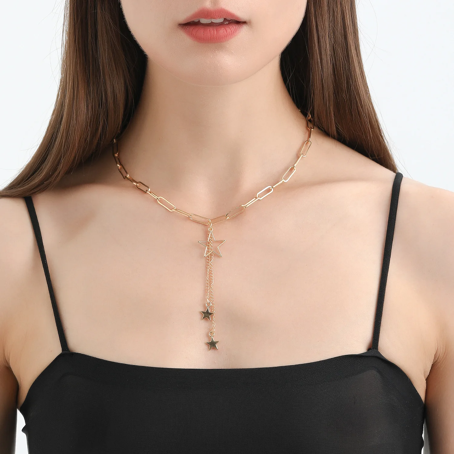 Fashion temperament single-layer return chain hollow star fringe pendant necklace female choker
Fashion temperament single-layer return chain hollow star fringe pendant necklace female choker