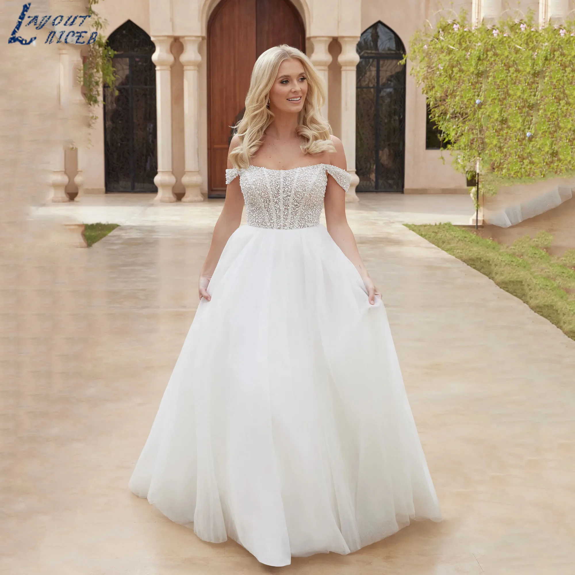 LAYOUT NICEB Plus Size Bridal Gowns Off Shoulder Romance Pearl Tulle Wedding Dress Strapless A-Line vestidos de novia Customized
LAYOUT NICEB Plus Size Bridal Gowns Off Shoulder Romance Pearl Tulle Wedding Dress Strapless A-Line vestidos de novia Customized