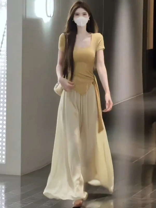 Fashionable Sweet And Spicy Ice Silk Wide Leg Pants Short Sleeve Top Women's Summer Slim Fit Two Piece Set Casual Sportswear
Fashionable Sweet And Spicy Ice Silk Wide Leg Pants Short Sleeve Top Women's Summer Slim Fit Two Piece Set Casual Sportswear
