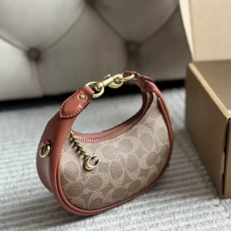 2025 new crescent retro versatile portable shoulder crossbody leather handbag small waste handbag
2025 new crescent retro versatile portable shoulder crossbody leather handbag small waste handbag