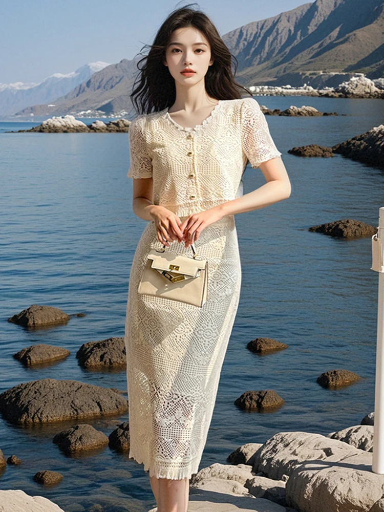New Summer Beige Tassel Embroidery Flower Two Piece Set Women's O Neck Single Breasted Shirt + High Waist Long Skirt Suits 
New Summer Beige Tassel Embroidery Flower Two Piece Set Women's O Neck Single Breasted Shirt + High Waist Long Skirt Suits