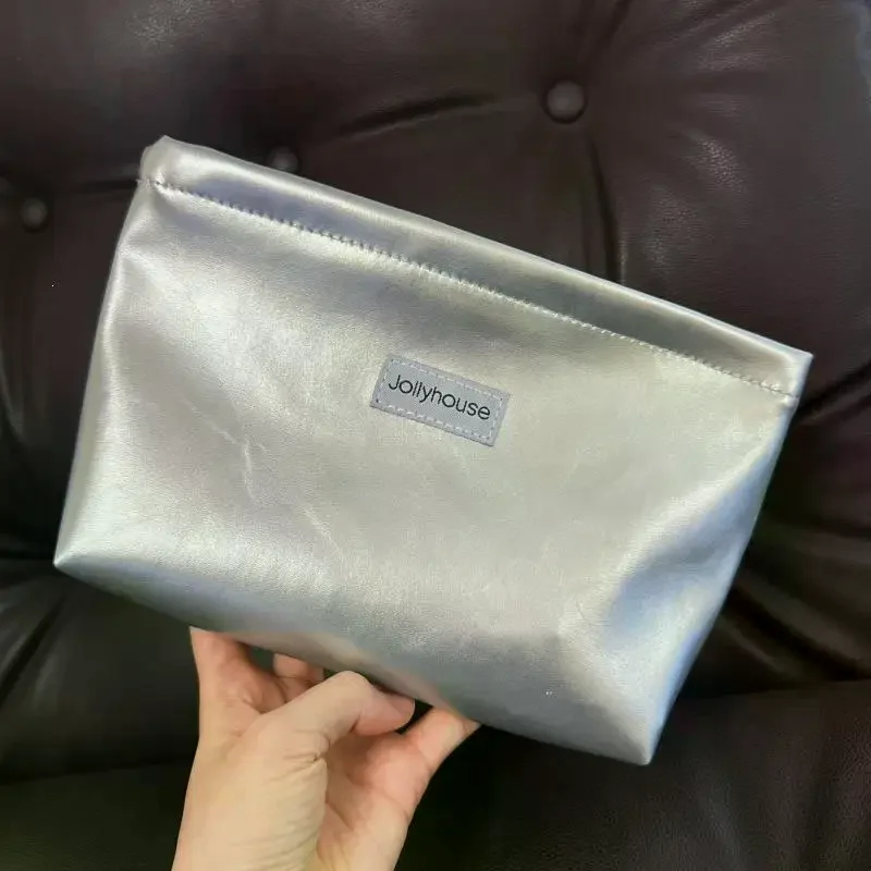Portable Large Capacity Makeup Bag Silver PU Toiletry Bag Multifunctional With Zipper Cosmetic Bag Multi-Purpose Use
Portable Large Capacity Makeup Bag Silver PU Toiletry Bag Multifunctional With Zipper Cosmetic Bag Multi-Purpose Use