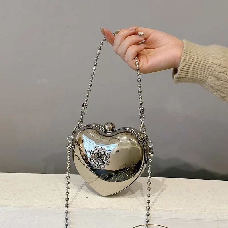 Designer Lipstick pouch Fashion Chain Shoulder Bag Heart Handbag Sense of luxury Brand Women Bags High quality New Crossbody Bag
Designer Lipstick pouch Fashion Chain Shoulder Bag Heart Handbag Sense of luxury Brand Women Bags High quality New Crossbody Bag