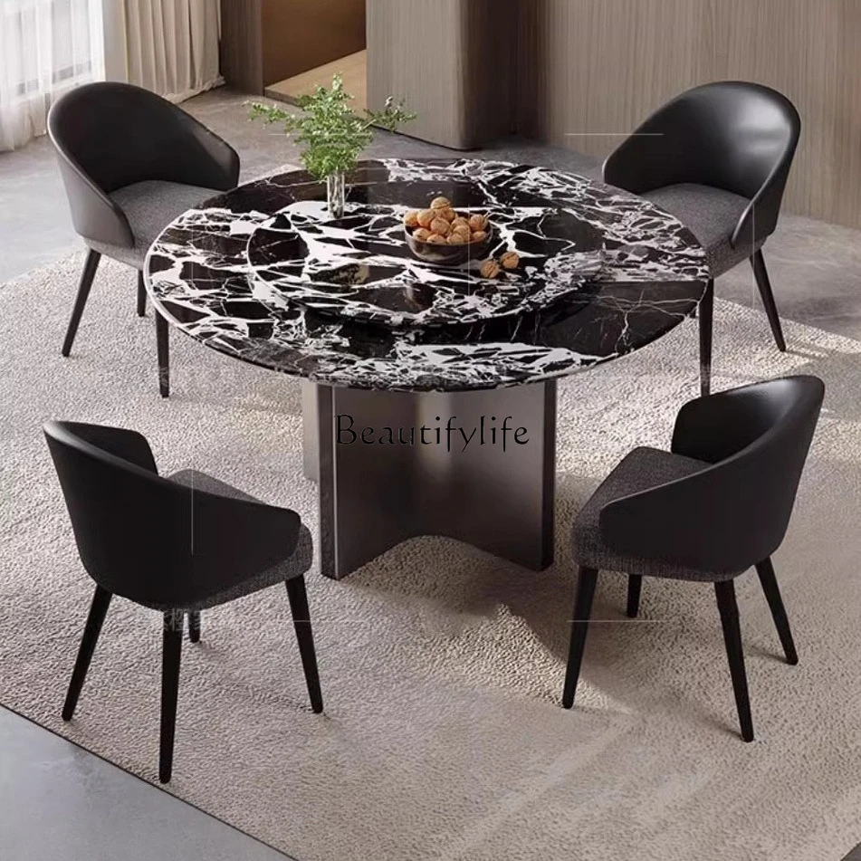 Italian minimalist round dining table household light luxury modern minimalist high-end round table
Italian minimalist round dining table household light luxury modern minimalist high-end round table