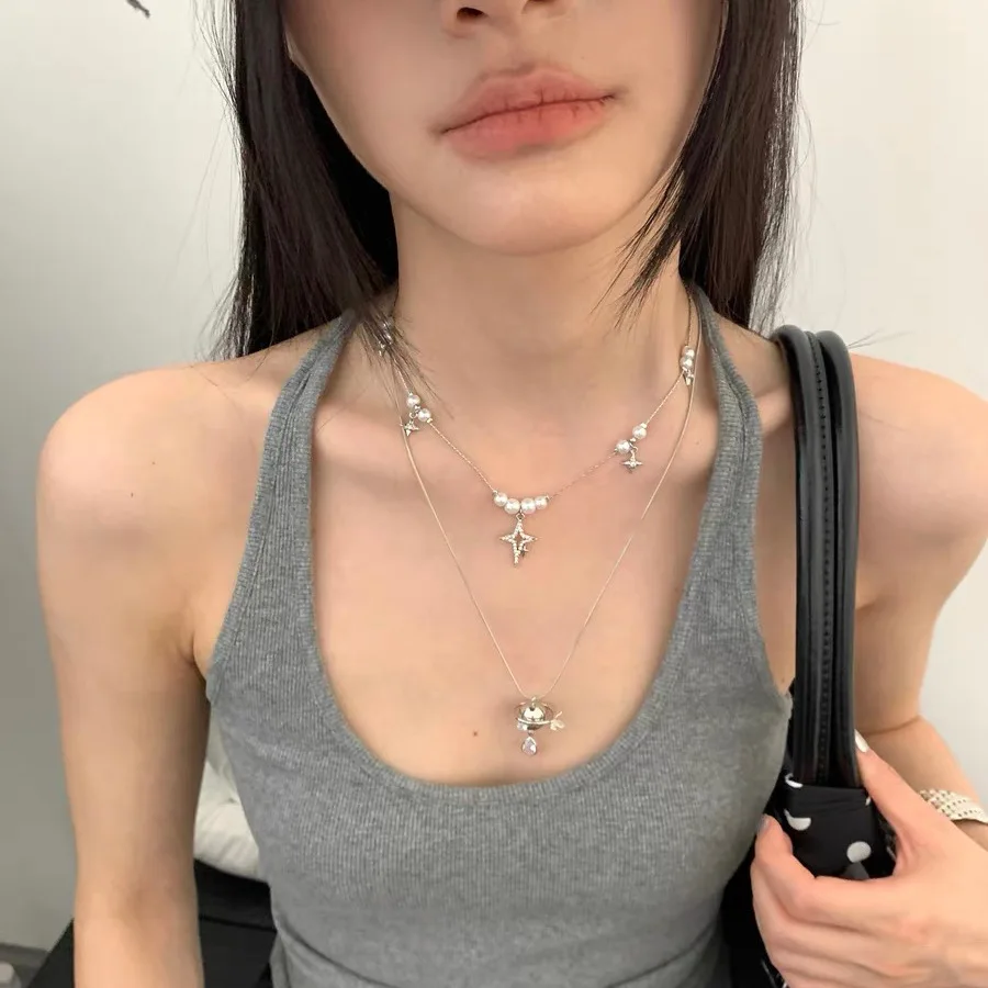 Double Stacked Planet Saturn Necklace Female Premium Pearl Clavicle Chain Sweet Cool Versatile Necklace
Double Stacked Planet Saturn Necklace Female Premium Pearl Clavicle Chain Sweet Cool Versatile Necklace