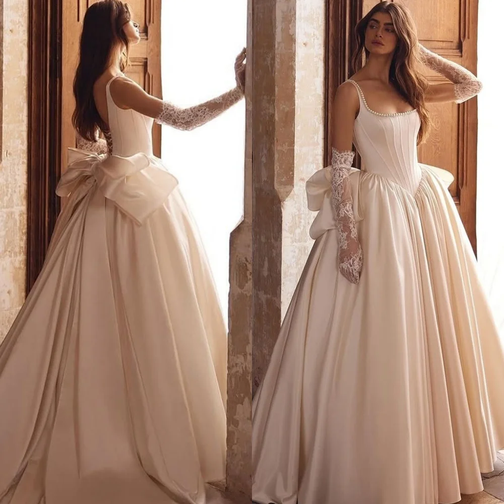 Customized Modern Satin Wedding Dresses Charming Strapless Sleeveless Hall Wedding Dress Luxury Bow Lace Up Back Formal Dress
Customized Modern Satin Wedding Dresses Charming Strapless Sleeveless Hall Wedding Dress Luxury Bow Lace Up Back Formal Dress