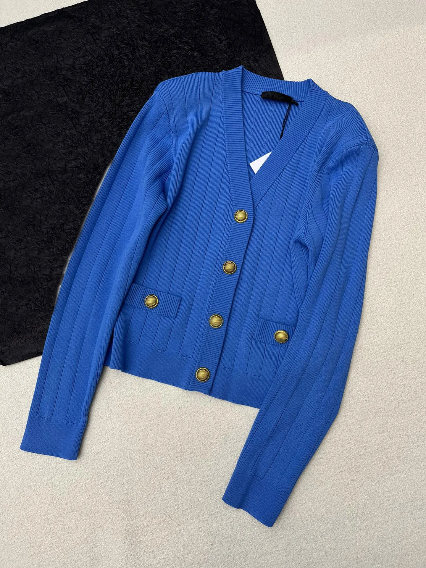 Women's Clothing Fashion small shoulder pad design metal contrast button knitted cardigan Autumn Winter New NO.9
Women's Clothing Fashion small shoulder pad design metal contrast button knitted cardigan Autumn Winter New NO.9
