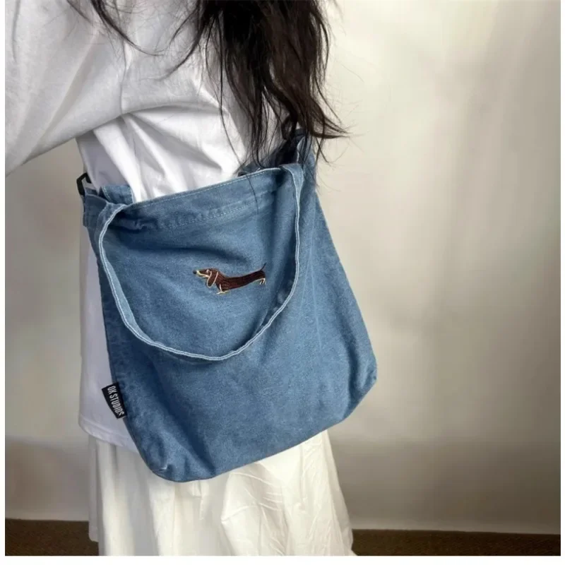 Original Design Dog Embroidery Vintage Crossbody Single Shoulder Hand-held Denim Canvas Bag Korean Commuting Boys Girls Backpack
Original Design Dog Embroidery Vintage Crossbody Single Shoulder Hand-held Denim Canvas Bag Korean Commuting Boys Girls Backpack