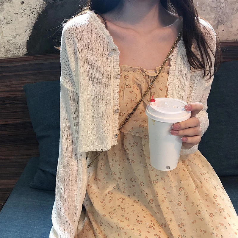 Ice Silk Women's Summer Outerwear Shawl Sun Protection Light Knitted Short Coat V-Neck Button Long Sleeve Loose Fit Casual Style
Ice Silk Women's Summer Outerwear Shawl Sun Protection Light Knitted Short Coat V-Neck Button Long Sleeve Loose Fit Casual Style
