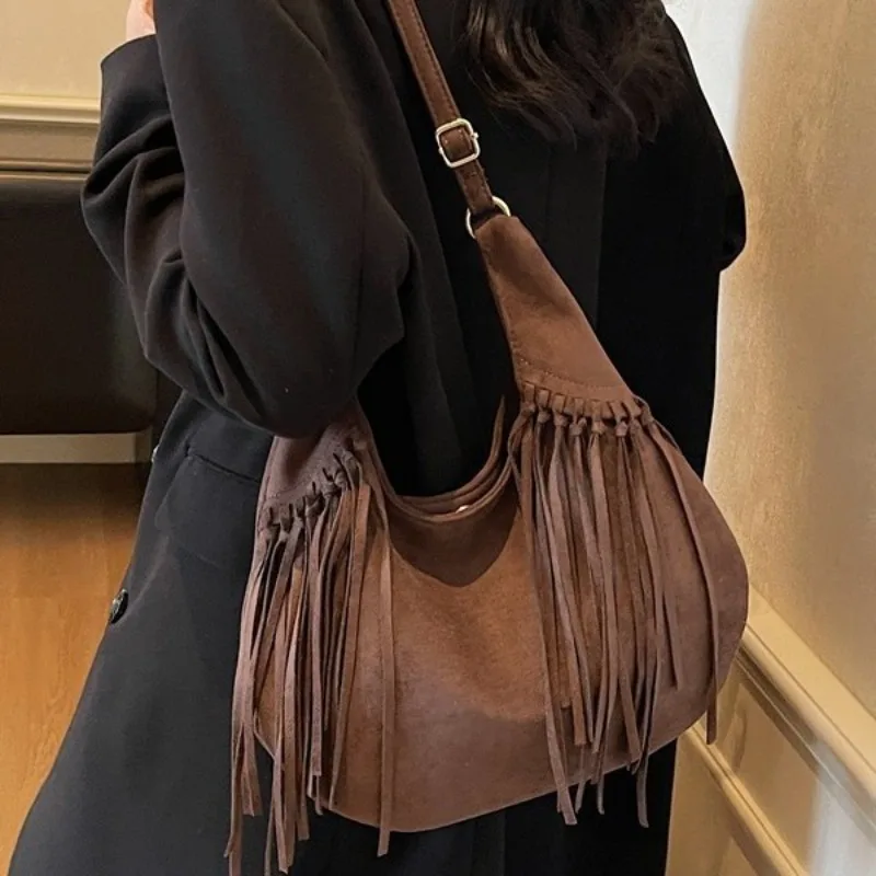 Женская сумка, американская нишевая богемная большая сумка с кисточками, новинка 2026, замшевое ведро, универсальная сумка через плечо на одно плечо
Женская сумка, американская нишевая богемная большая сумка с кисточками, новинка 2026, замшевое ведро, универсальная сумка через плечо на одно плечо