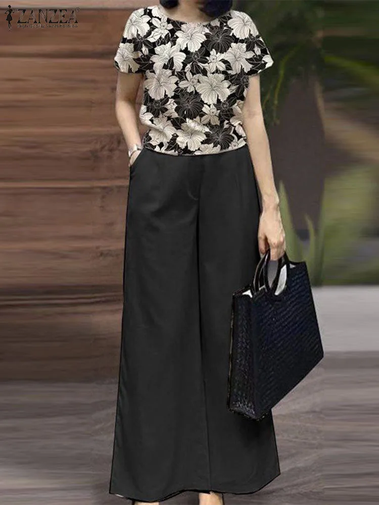 2024 ZANZEA Vintage Matching Sets Summer Floral Tracksuits Women Short Sleeve Blouse Wide Leg Pant Sets Elegant OL Work Suits
2024 ZANZEA Vintage Matching Sets Summer Floral Tracksuits Women Short Sleeve Blouse Wide Leg Pant Sets Elegant OL Work Suits
