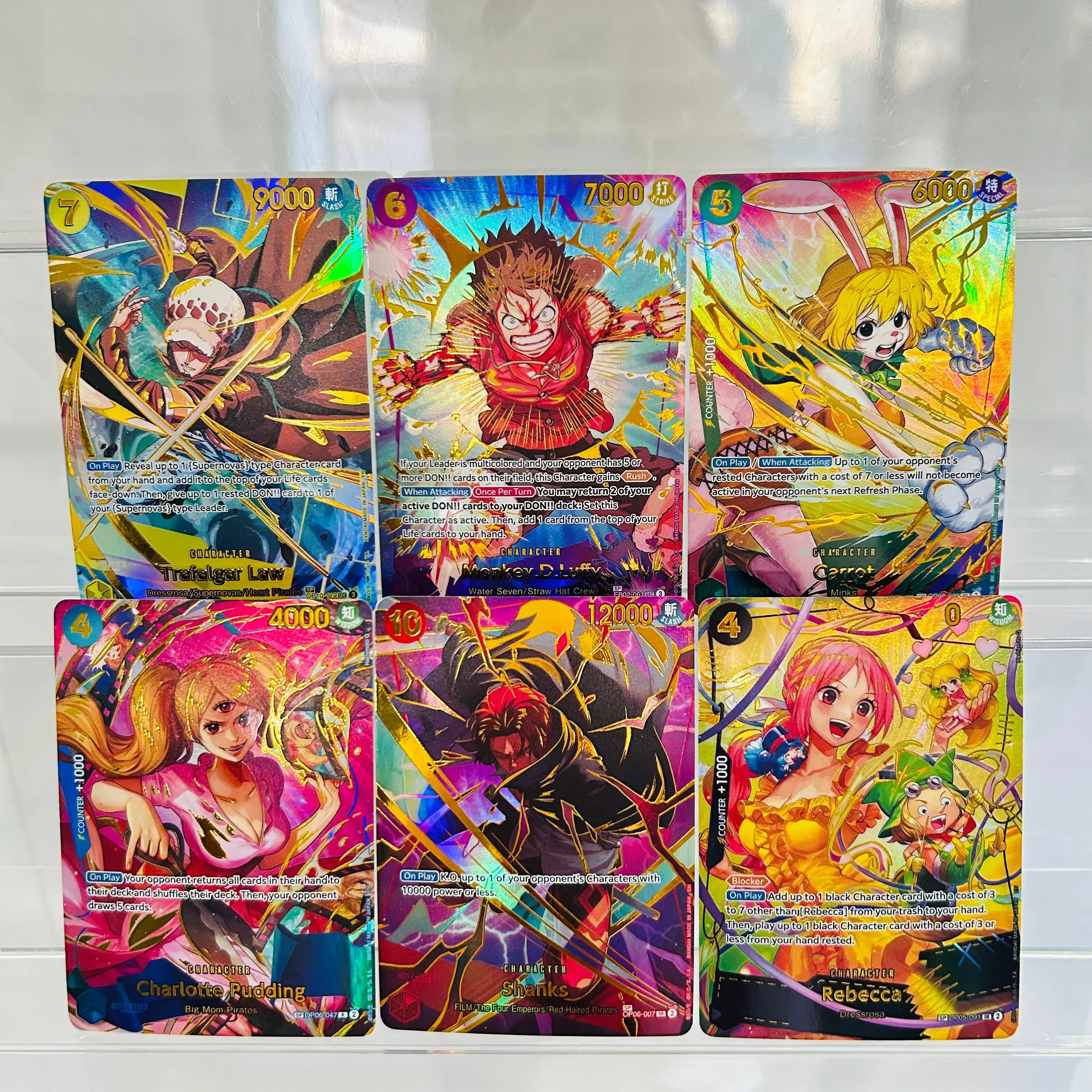 One Piece 6pcs Law Luffy Carrot Pudding Shanks Rebecca DIY Cards Gold Foil & Holographic Texture Premium Anime Collection Cards
One Piece 6pcs Law Luffy Carrot Pudding Shanks Rebecca DIY Cards Gold Foil & Holographic Texture Premium Anime Collection Cards
