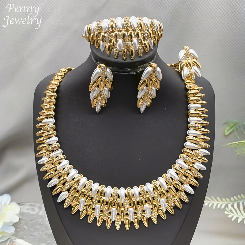 Роскошный нигерийский Дубай 18-каратного позолоченного комплекта ювелирных изделий, колье, ожерелье, серьги-капли, браслет, кольцо, африканские свадебные подарки для свадебной вечеринки
Роскошный нигерийский Дубай 18-каратного позолоченного комплекта ювелирных изделий, колье, ожерелье, серьги-капли, браслет, кольцо, африканские свадебные подарки для свадебной вечеринки