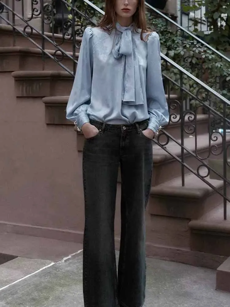 European and American style autumn and winter new fashion women's jacquard silk satin textured bow-embellished shirt
European and American style autumn and winter new fashion women's jacquard silk satin textured bow-embellished shirt