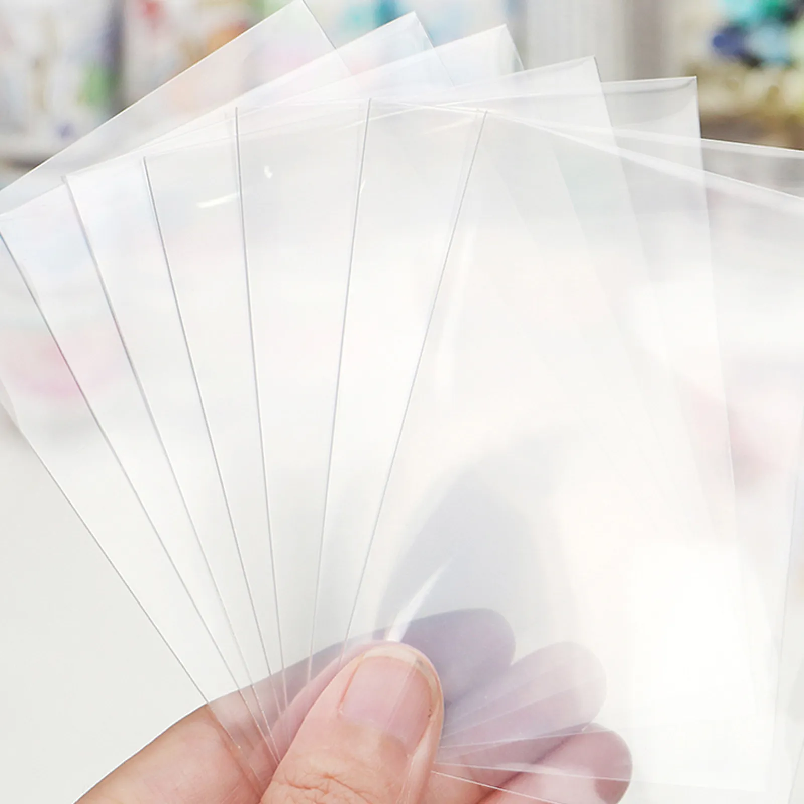 100Pcs Trading Card Protectors Transparent Top Open Card Sleeves Clear Deck Protective Covers for Sports Game Business Photo
100Pcs Trading Card Protectors Transparent Top Open Card Sleeves Clear Deck Protective Covers for Sports Game Business Photo