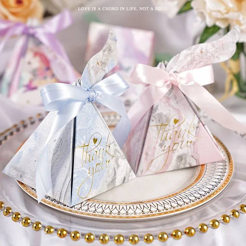 50pcs Triangular Pyramid Candy Box Baby Shower Favors Wedding Favors Gifts Box Party Supplies
50pcs Triangular Pyramid Candy Box Baby Shower Favors Wedding Favors Gifts Box Party Supplies