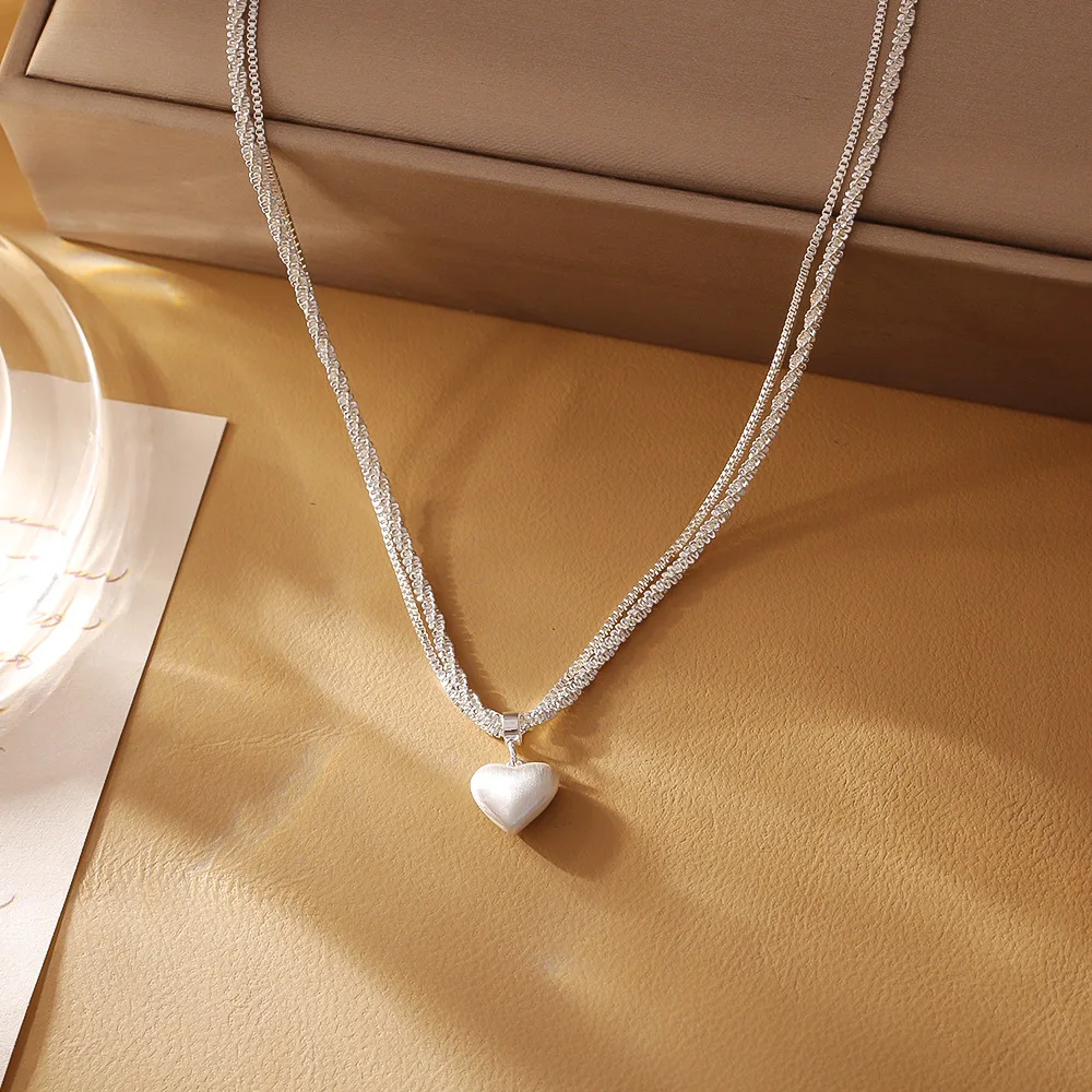 Silver brushed love double-layer necklace niche design light luxury exquisite fashion personality versatile clavicle chain
Silver brushed love double-layer necklace niche design light luxury exquisite fashion personality versatile clavicle chain