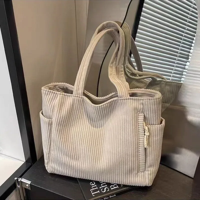 Casual Corduroy Handbag with Zipper Closure Light and Large Capacity Fixed Shoulder Strap Solid Color Daily Commuter Handbag
Casual Corduroy Handbag with Zipper Closure Light and Large Capacity Fixed Shoulder Strap Solid Color Daily Commuter Handbag